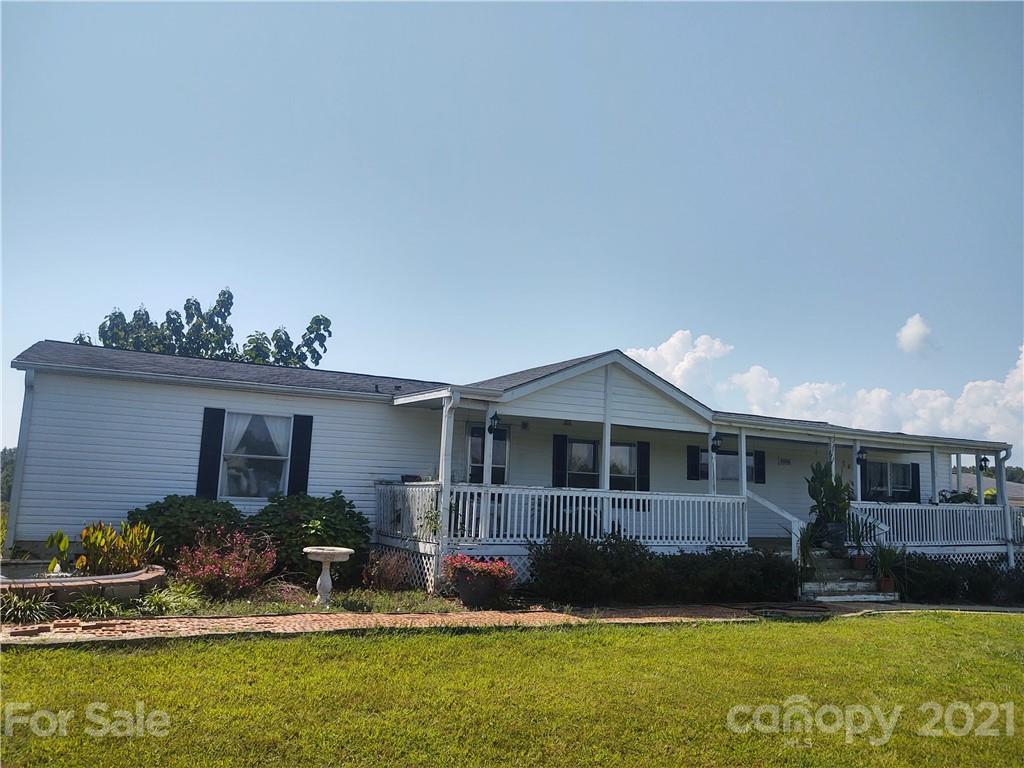 697 Moss Road Rutherfordton, NC 28139 - Photo 5 of 6 front view of a house with a yard