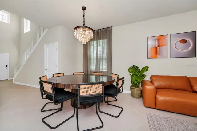 a view of a livingroom with furniture and window