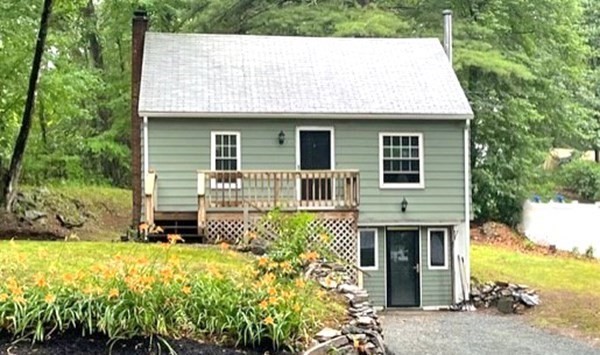 a house view with a garden space