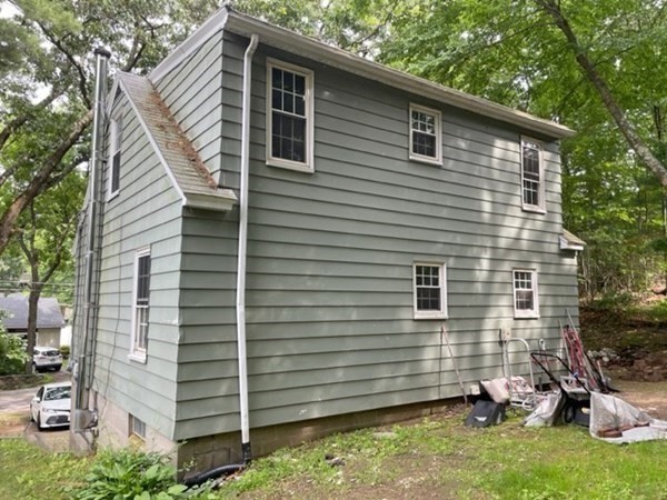 38 Boston Road Sutton, MA 01590 - Photo 6 of 19 a view of a house with a yard