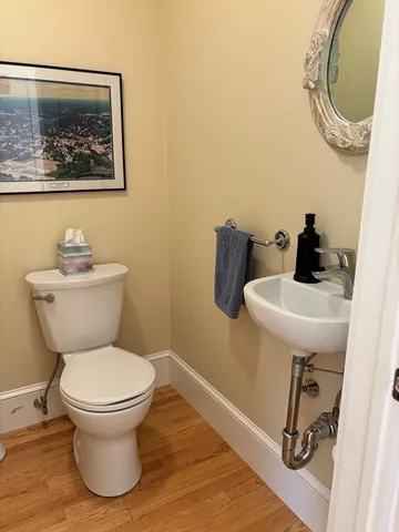 a bathroom with a toilet and a sink