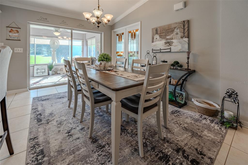 15143 Southwest 14th Avenue Road Ocala, FL 34473 - Photo 8 of 53 a view of a dining room with furniture window and outside view