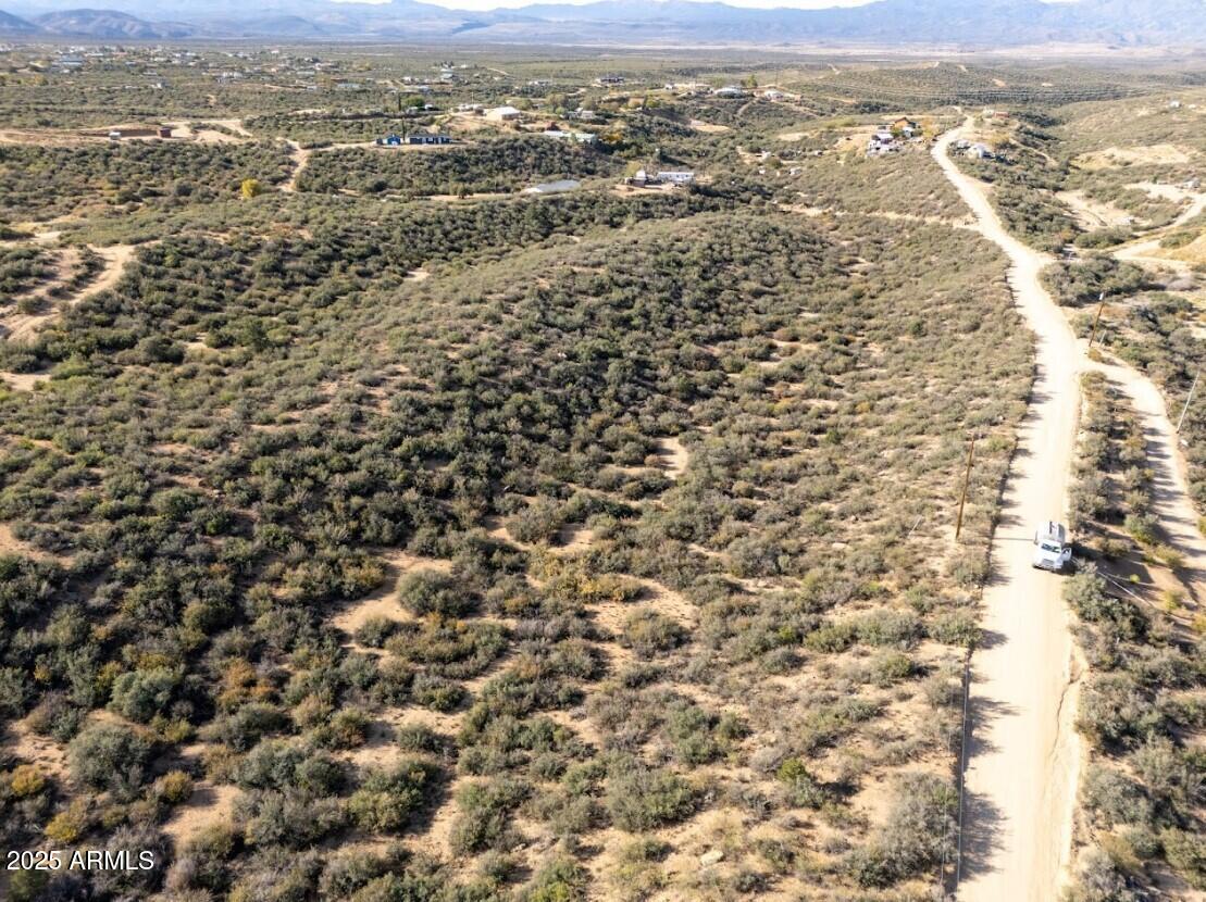 8155 West Framingham Road, Unit 219 Kirkland, AZ 86332 - Photo 11 of 22 an aerial view of residential houses with outdoor space
