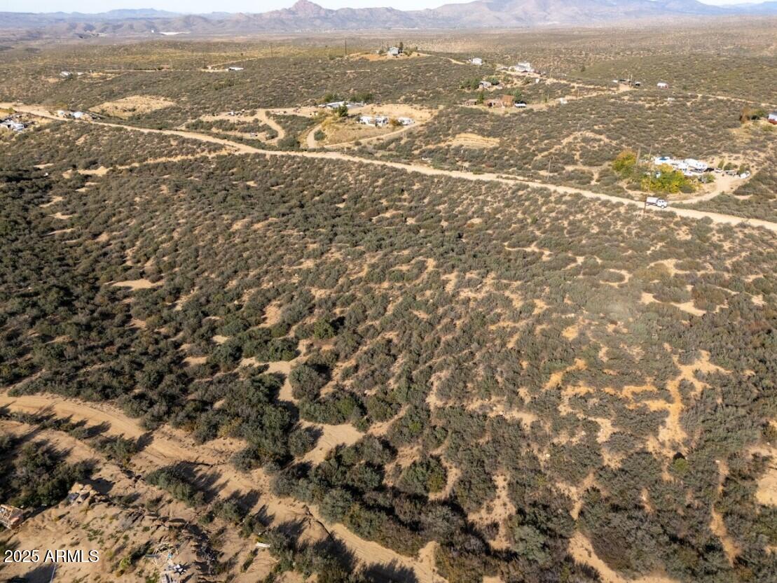 8155 West Framingham Road, Unit 219 Kirkland, AZ 86332 - Photo 12 of 22 an aerial view of residential houses with outdoor space