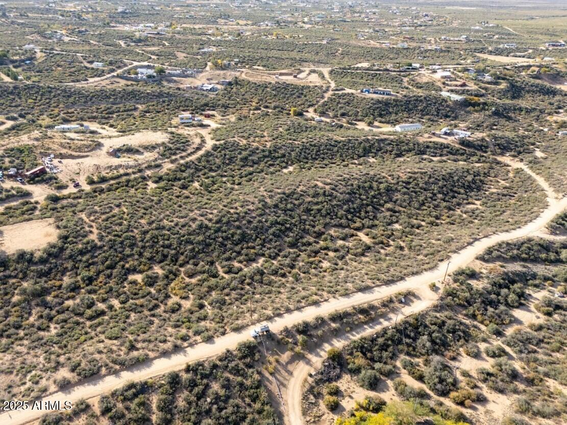 8155 West Framingham Road, Unit 219 Kirkland, AZ 86332 - Photo 8 of 22 an aerial view of residential house and parking space