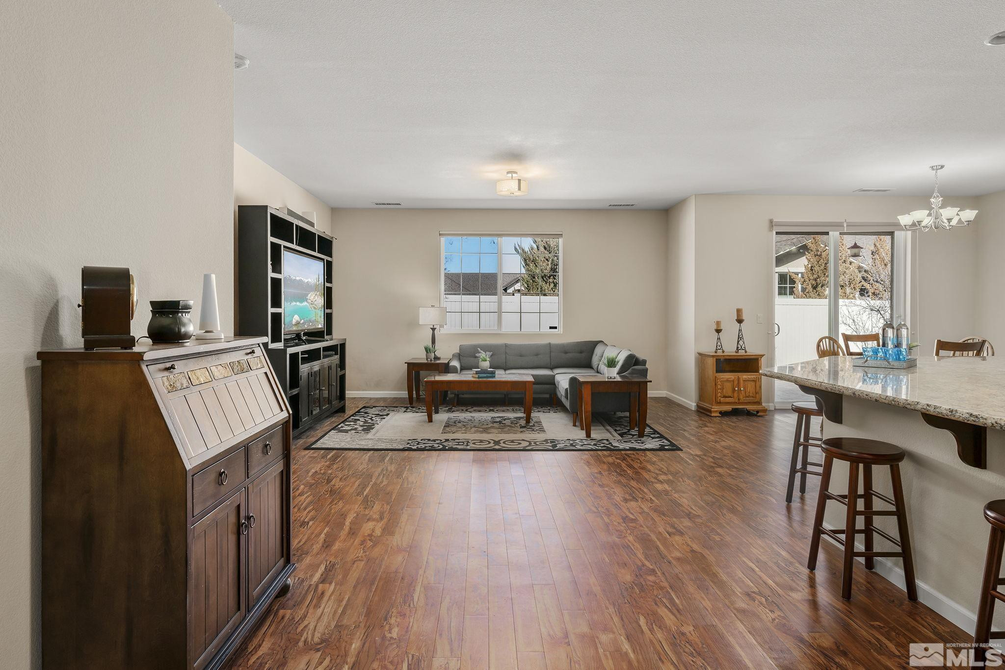 2249 Dominic Drive Reno, NV 89521 - Photo 3 of 22 a room with furniture and a wooden floor