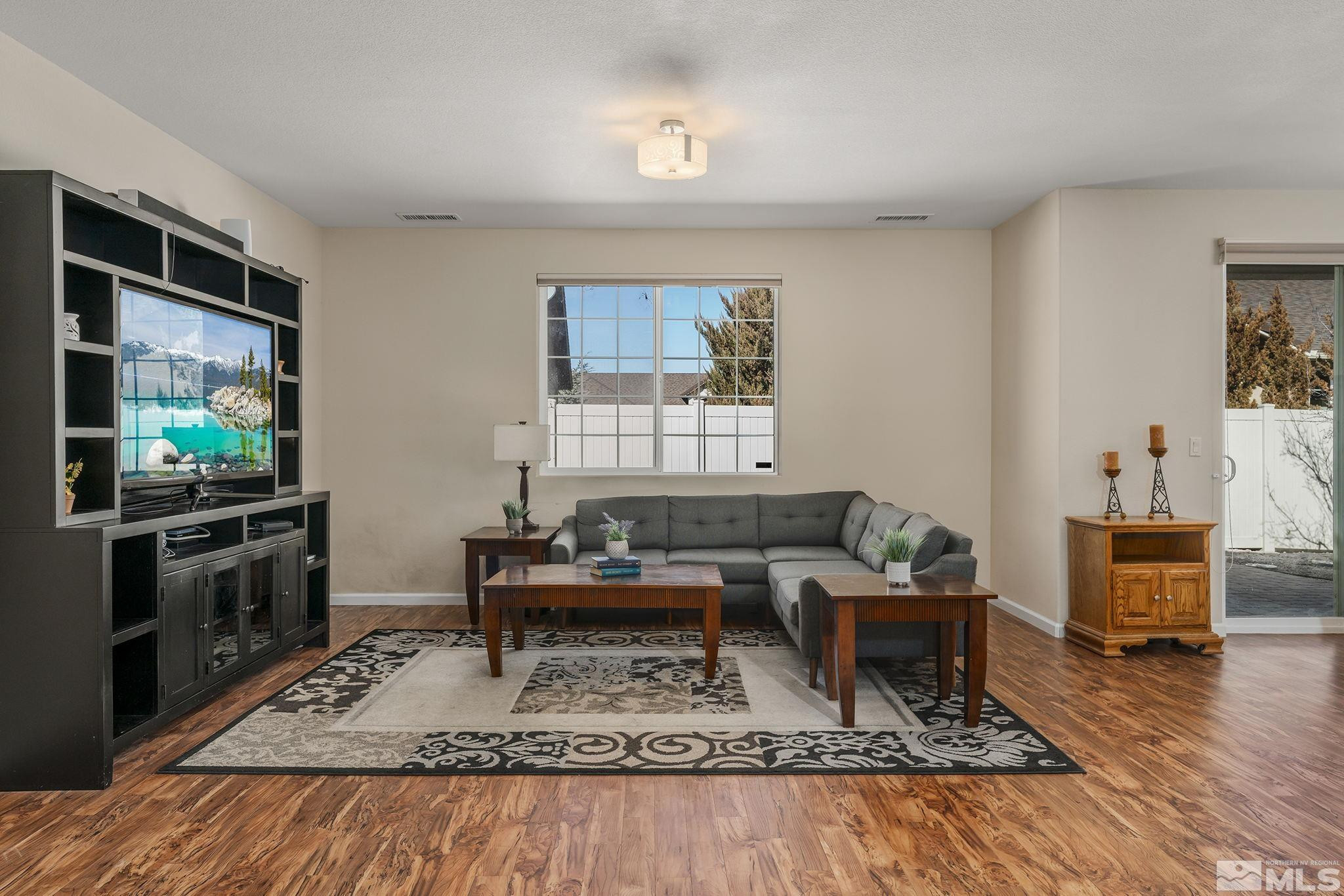 2249 Dominic Drive Reno, NV 89521 - Photo 4 of 22 a living room with furniture and a flat screen tv