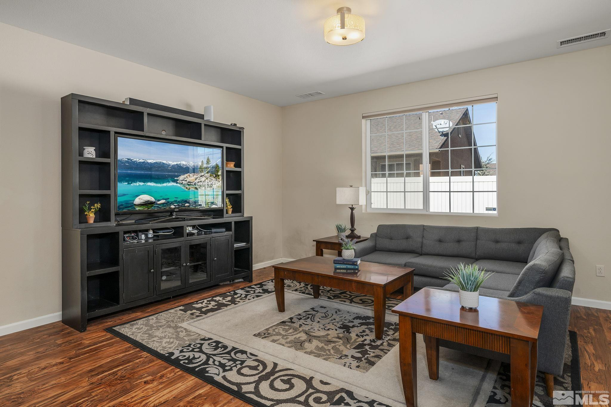 2249 Dominic Drive Reno, NV 89521 - Photo 5 of 22 a living room with furniture and a flat screen tv