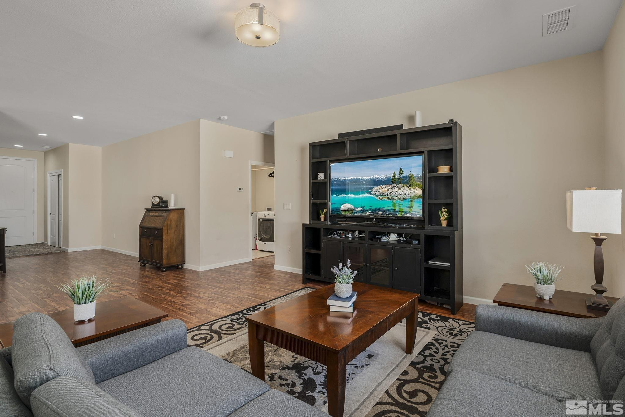2249 Dominic Drive Reno, NV 89521 - Photo 7 of 22 a living room with furniture and a flat screen tv