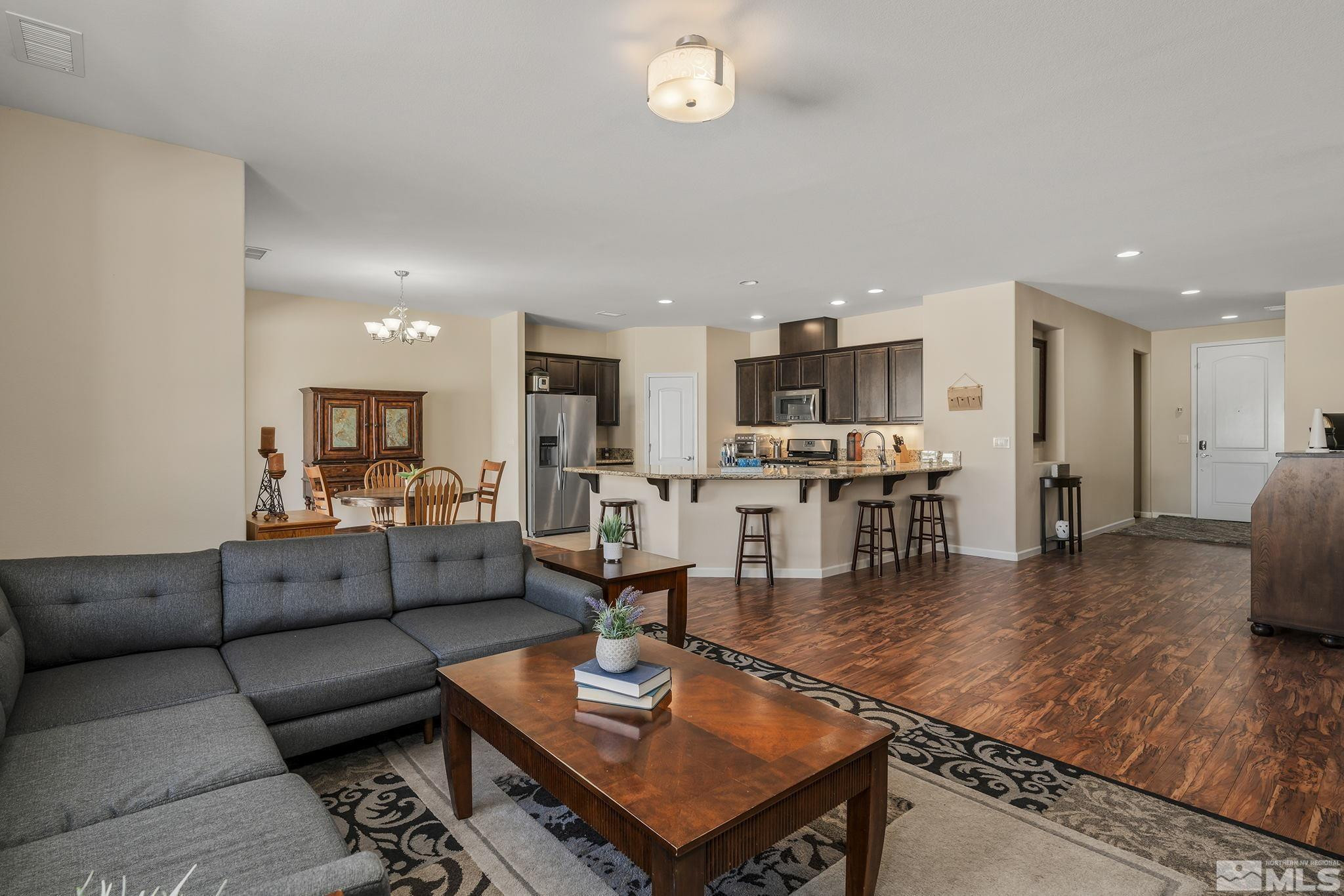 2249 Dominic Drive Reno, NV 89521 - Photo 8 of 22 a living room with furniture wooden floor and kitchen view