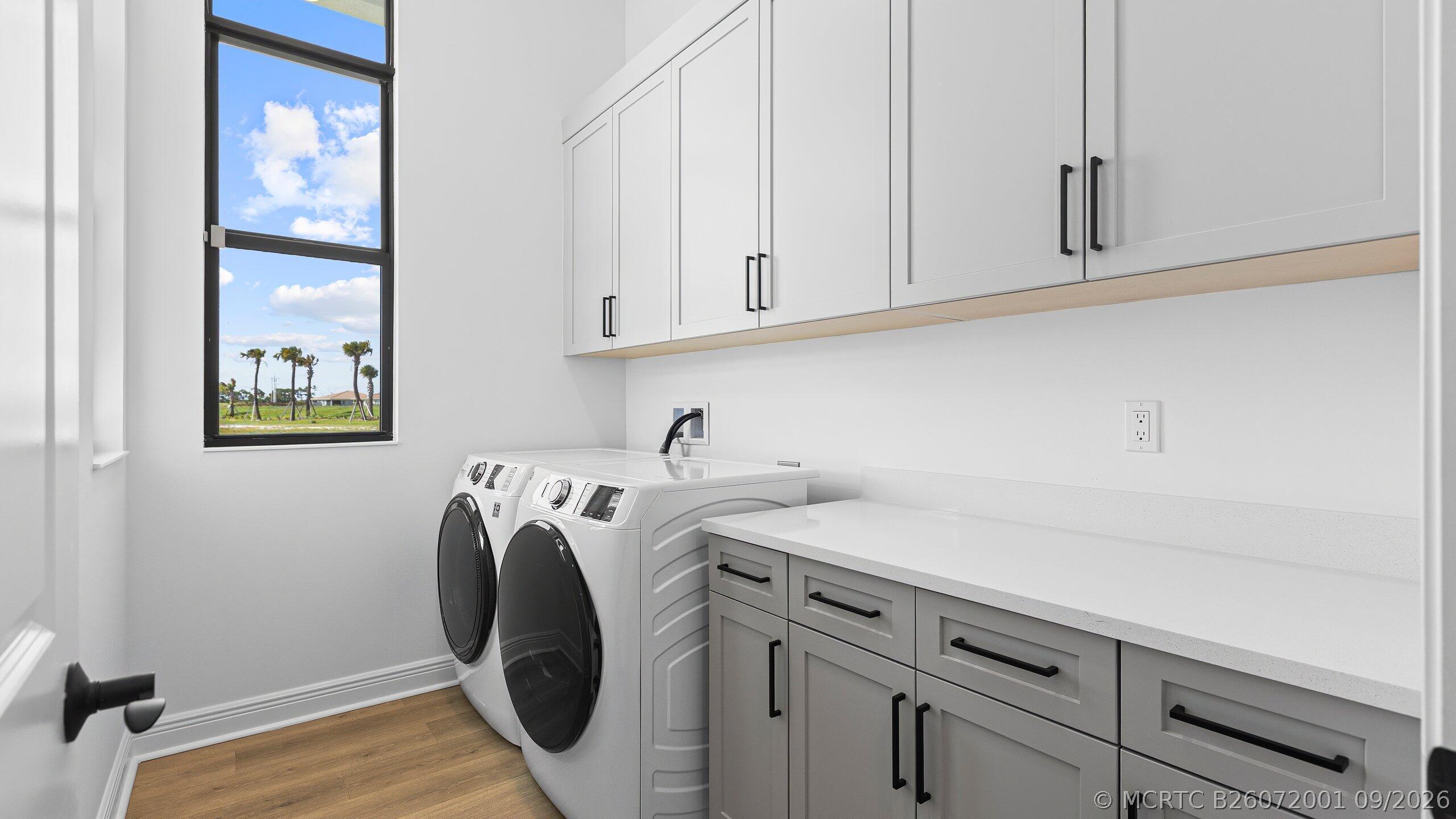 7999 Southwest Andrea Way Port St. Lucie, FL 34987 - Photo 26 of 64 Laundry