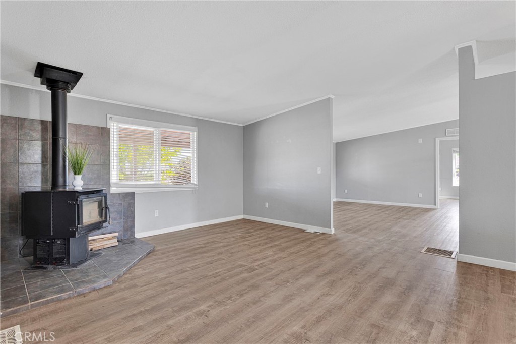 8074 Mira Mar Road Phelan, CA 92371 - Photo 14 of 49 a view of a livingroom with furniture and a window