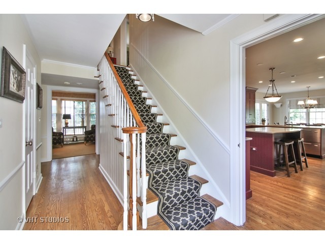 1039 Miami Road Wilmette, IL 60091 - Photo 3 of 25 a view of entryway and hall with wooden floor