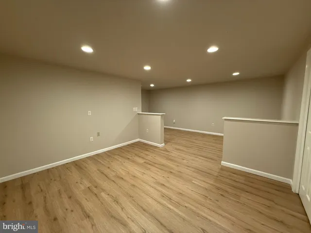 a view of house with a bench