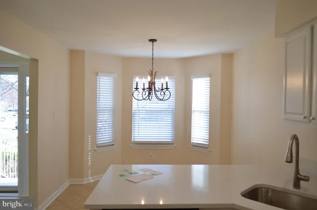 a view of a hallway with windows