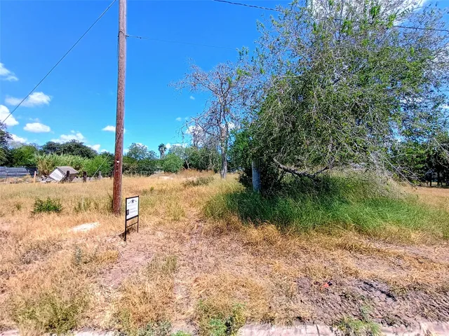 a view of a road with a yard