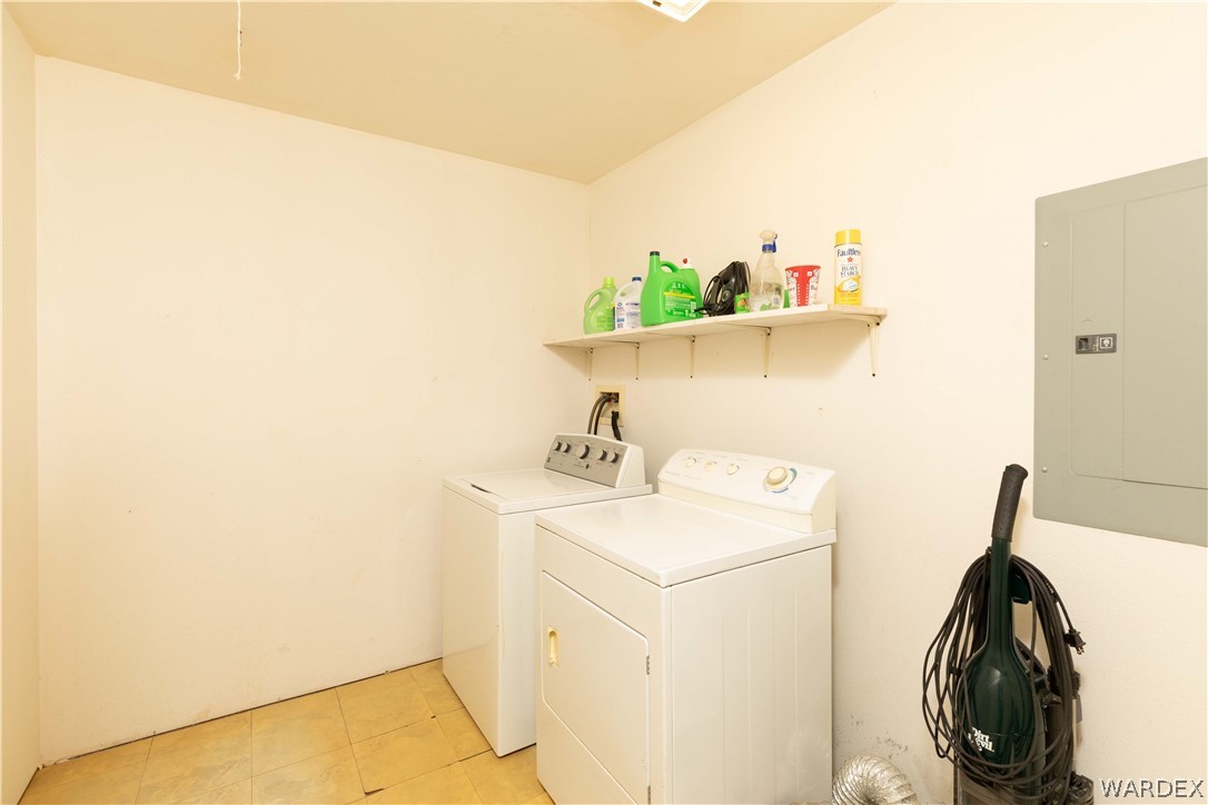 2136 Dewey Road Golden Valley, AZ 86413 - Photo 26 of 44 a utility room with dryer and washer