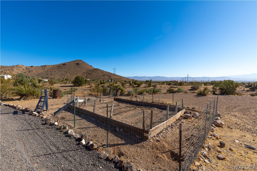 2136 Dewey Road Golden Valley, AZ 86413 - Photo 40 of 44 a view of a terrace with sitting area