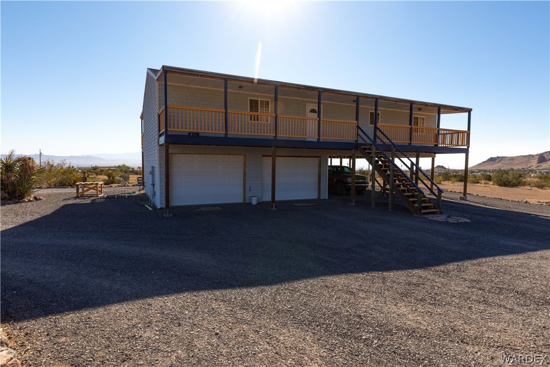 2136 Dewey Road Golden Valley, AZ 86413 - Photo 7 of 44 a view of balcony with wooden floor