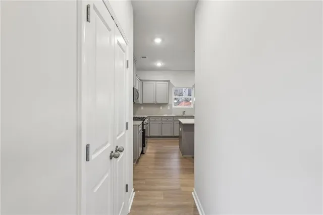 a view of a kitchen from the hallway