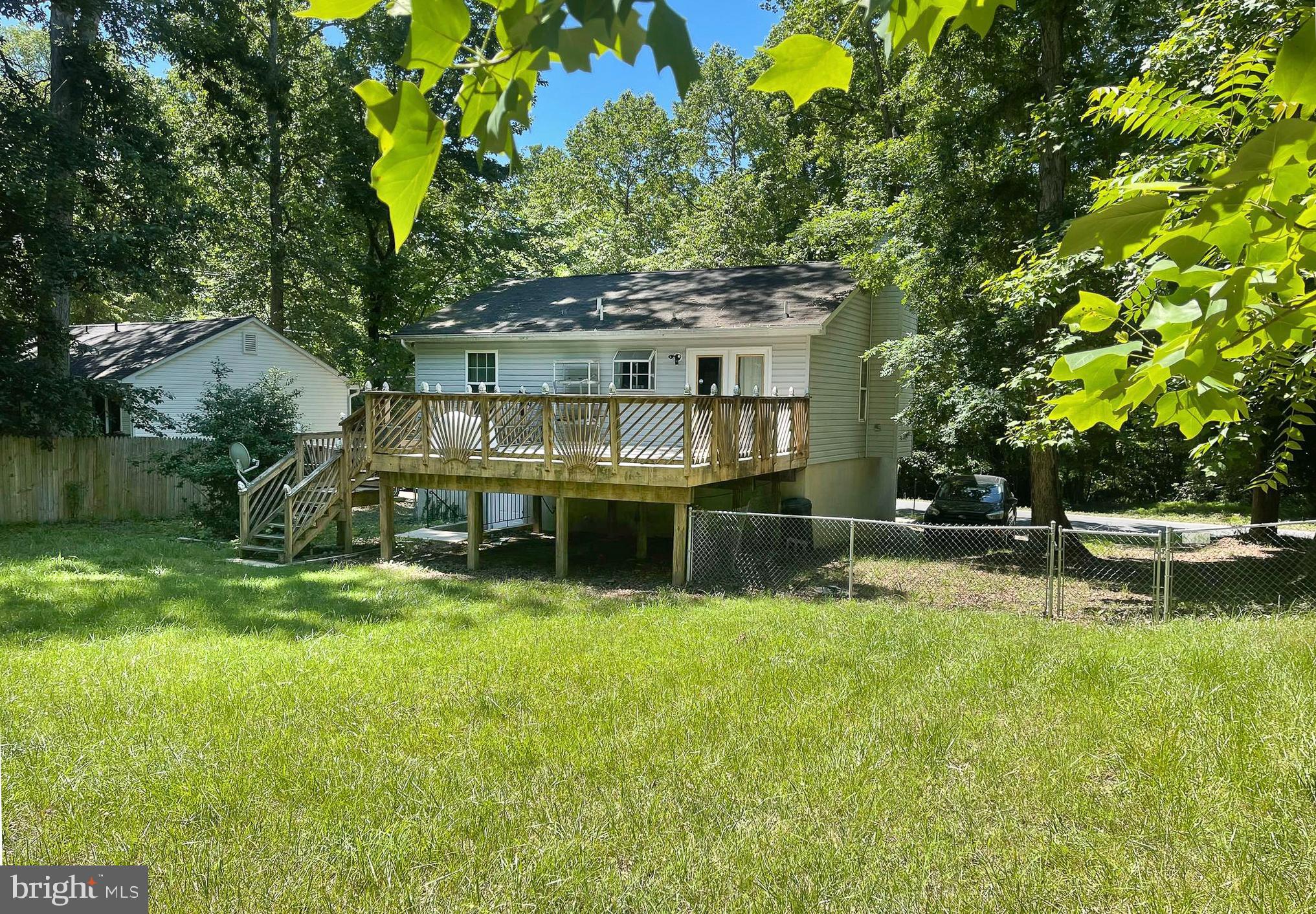 1084 Rimrock Road Lusby, MD 20657 - Photo 4 of 29 Large deck great for outdoor entertaining
