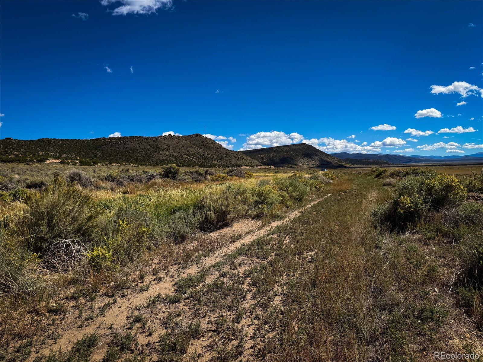 0 Herbert Road Fort Garland, CO 81133 - Photo 5 of 12 a view of a lake with a mountain