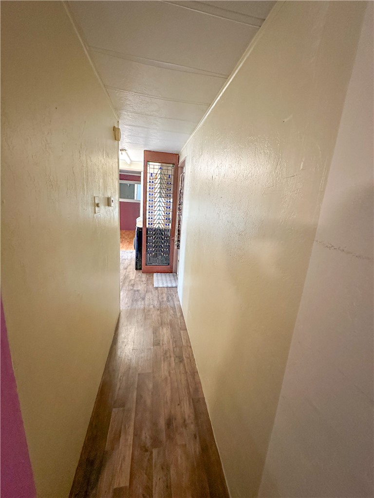1655 Ramar Road Bullhead City, AZ 86442 - Photo 13 of 49 Hall featuring hardwood / wood-style floors