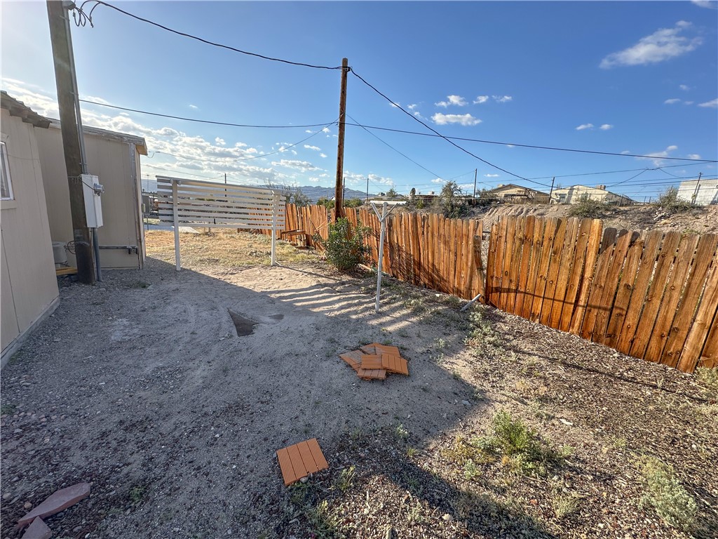 1655 Ramar Road Bullhead City, AZ 86442 - Photo 33 of 49 View of fenced backyard