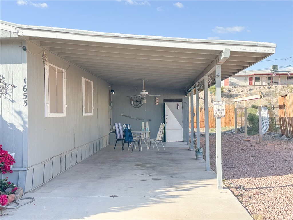 1655 Ramar Road Bullhead City, AZ 86442 - Photo 4 of 49 View of parking with a carport
