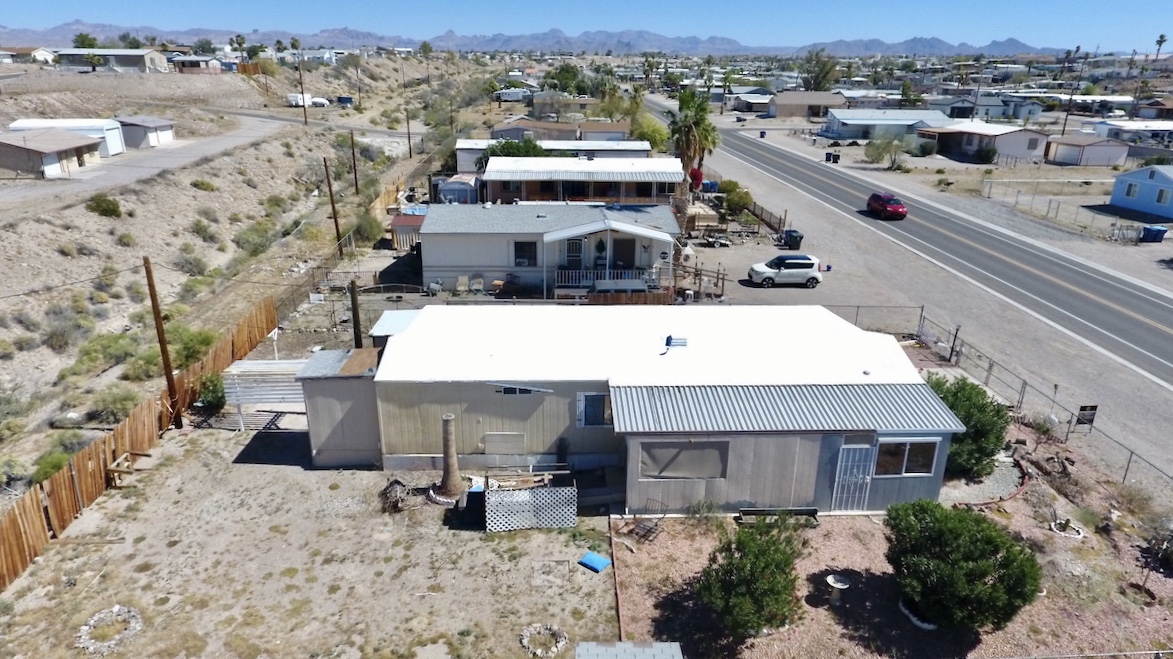 1655 Ramar Road Bullhead City, AZ 86442 - Photo 45 of 49 Aerial view of residential area with a mountain backdrop