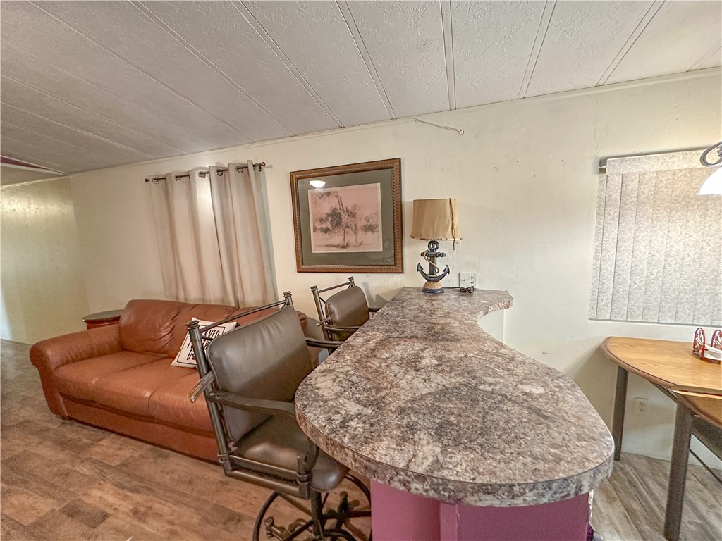 1655 Ramar Road Bullhead City, AZ 86442 - Photo 7 of 49 Dining room with light wood finished floors
