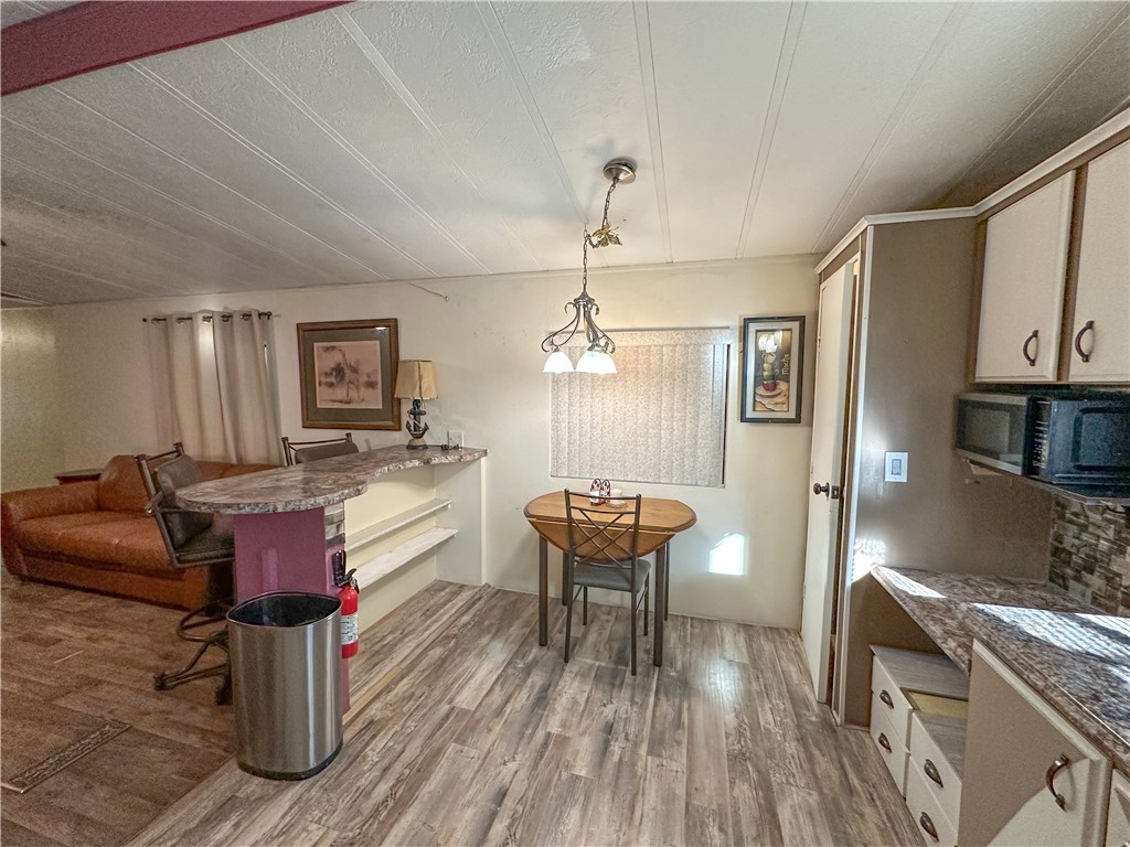 1655 Ramar Road Bullhead City, AZ 86442 - Photo 9 of 49 Dining area with light wood finished floors