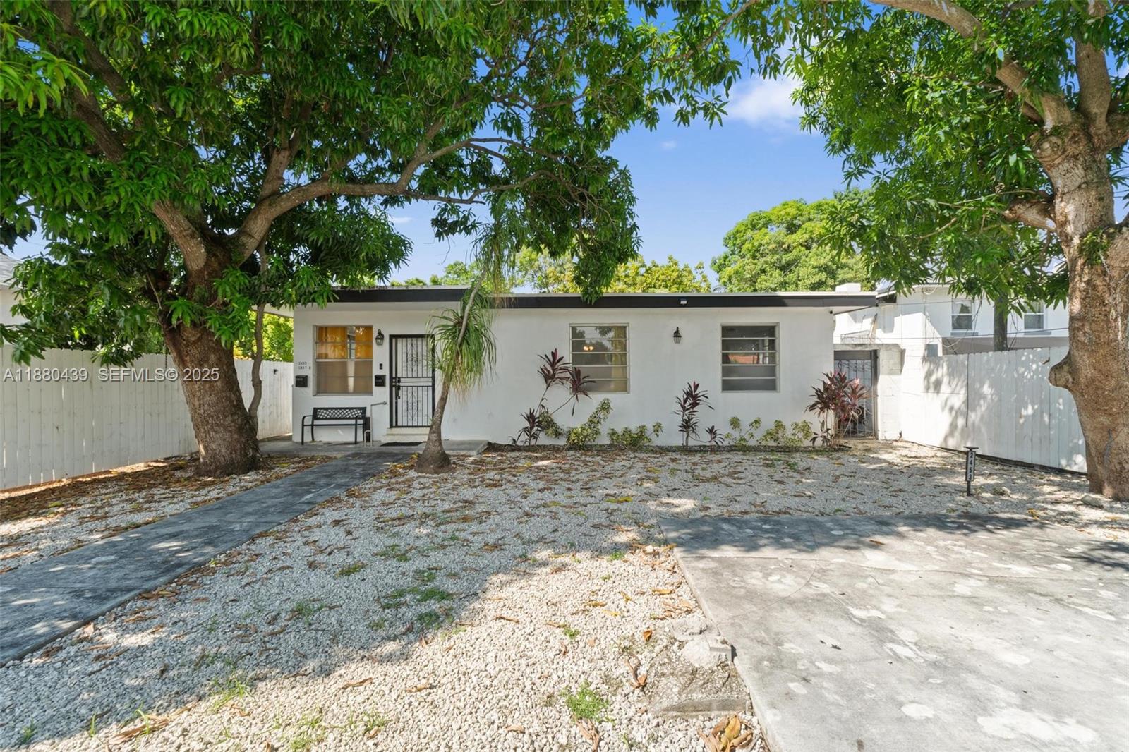 2453 Southwest 17th Street, Unit 2 Miami, FL 33145 - Photo 7 of 7 a view of a house with a backyard