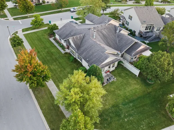 an aerial view of a house with a garden