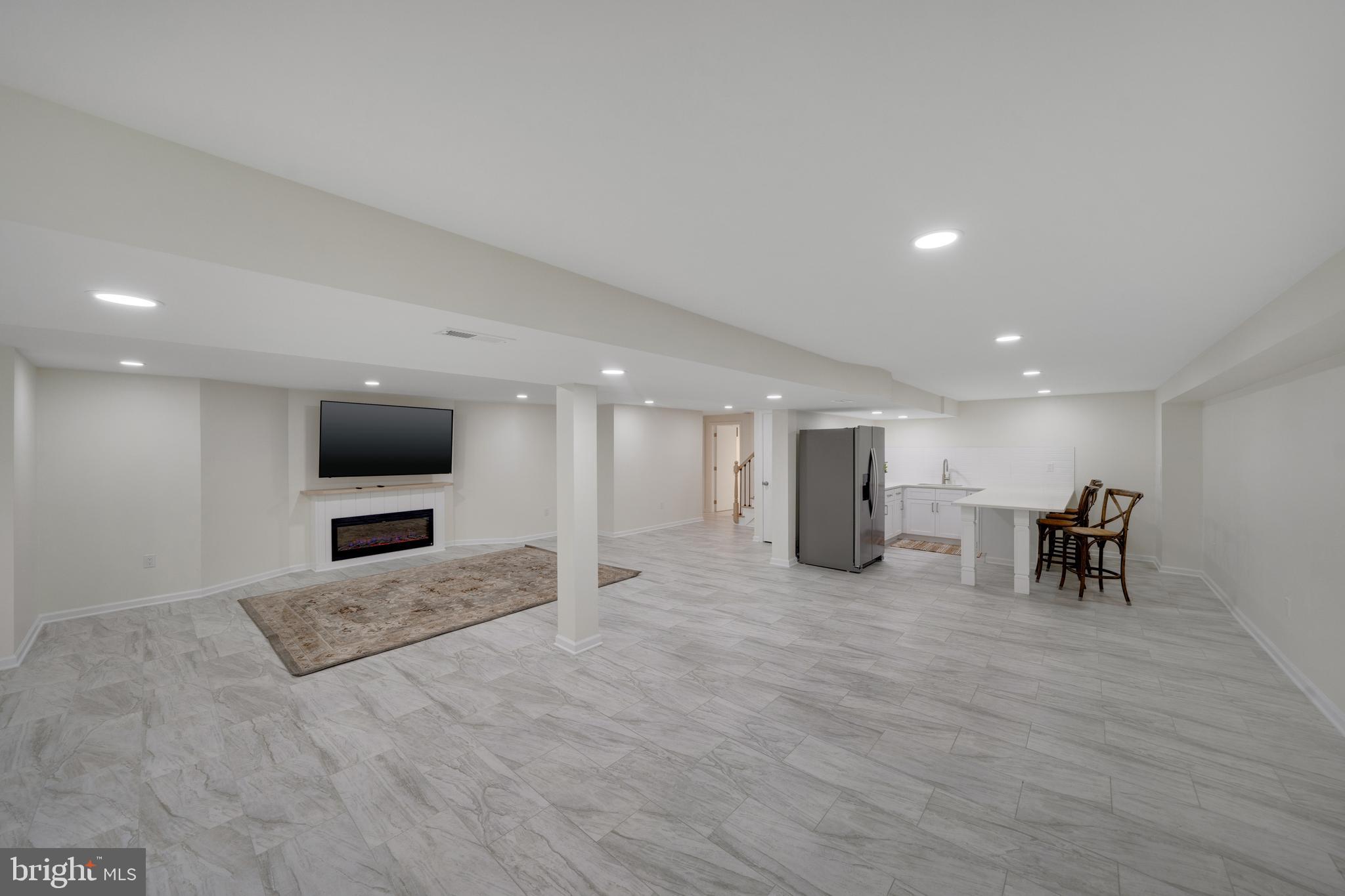 685 East Old Philadelphia Road Elkton, MD 21921 - Photo 41 of 64 Finished basement with fireplace and large bar