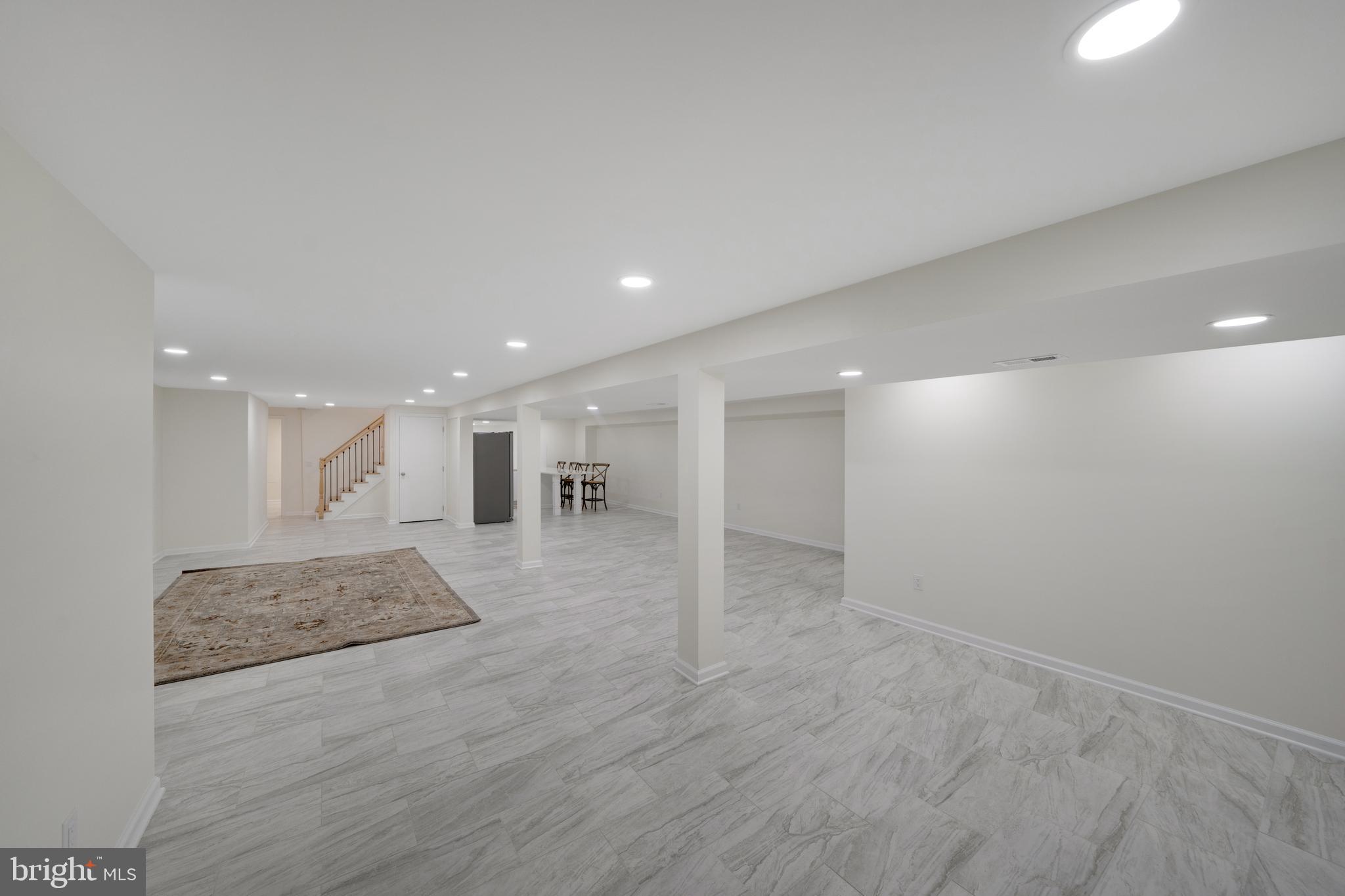 685 East Old Philadelphia Road Elkton, MD 21921 - Photo 42 of 64 Finished basement with fireplace and large bar