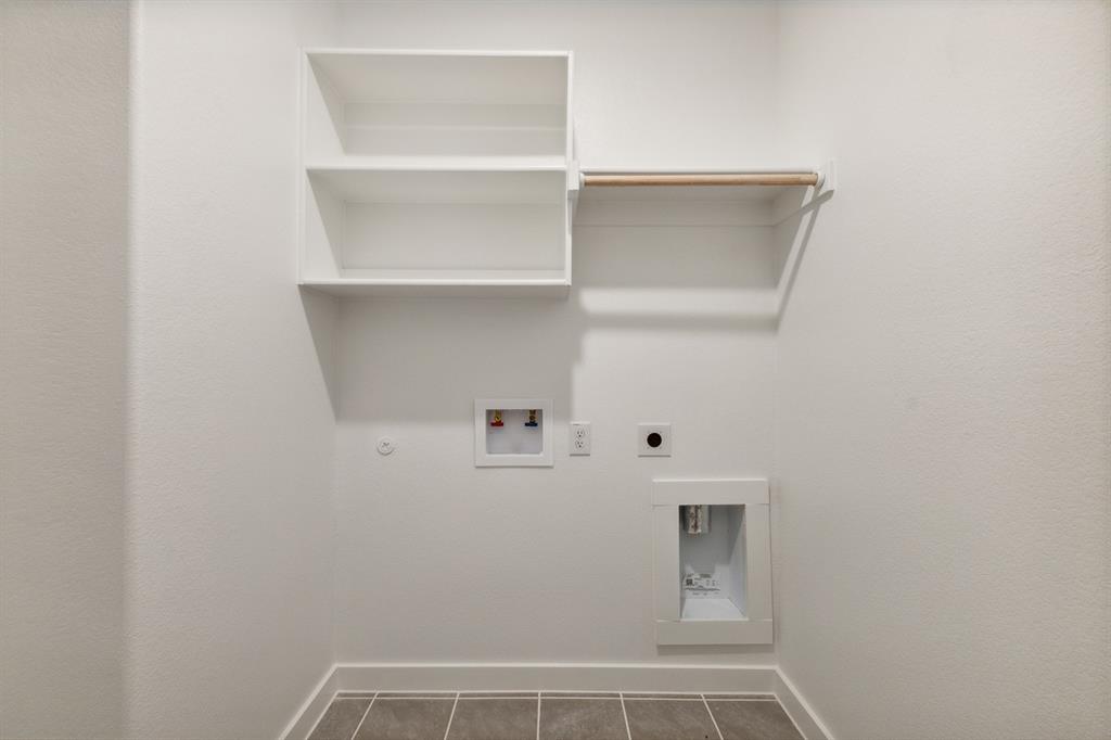 676 Poppy Lane Lavon, TX 75166 - Photo 18 of 35 Utility room in the Masters home plan by Trophy Signature Homes – REPRESENTATIVE PHOTO