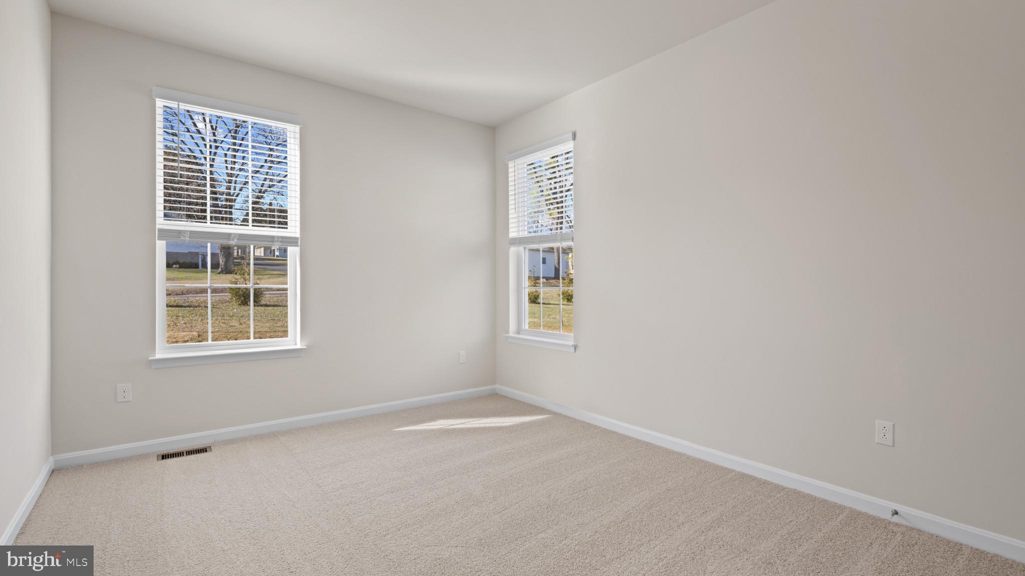 8 Comes Rdg Court Rosedale, MD 21237 - Photo 13 of 54 an empty room with windows