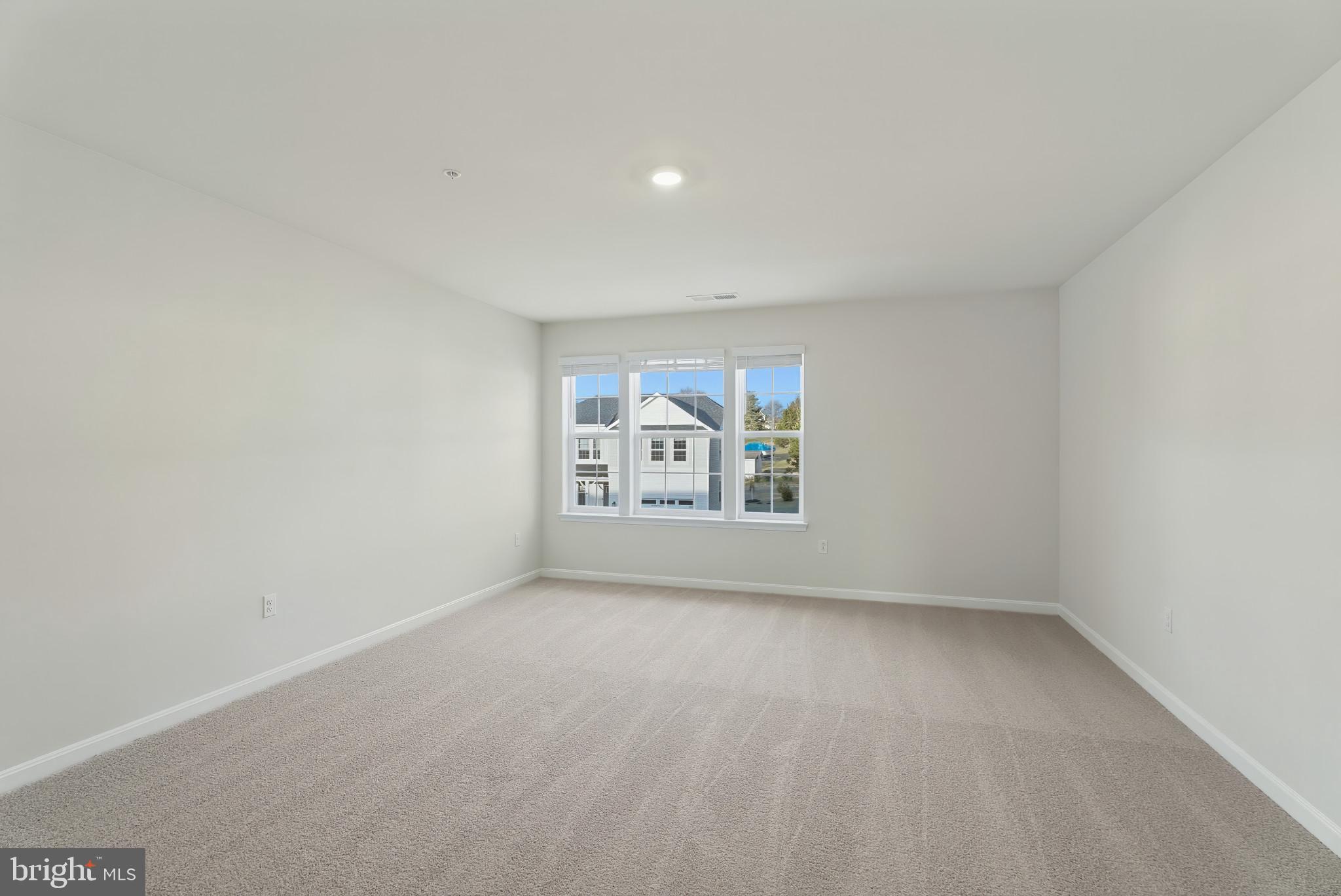 8 Comes Rdg Court Rosedale, MD 21237 - Photo 14 of 35 a view of an empty room with a window