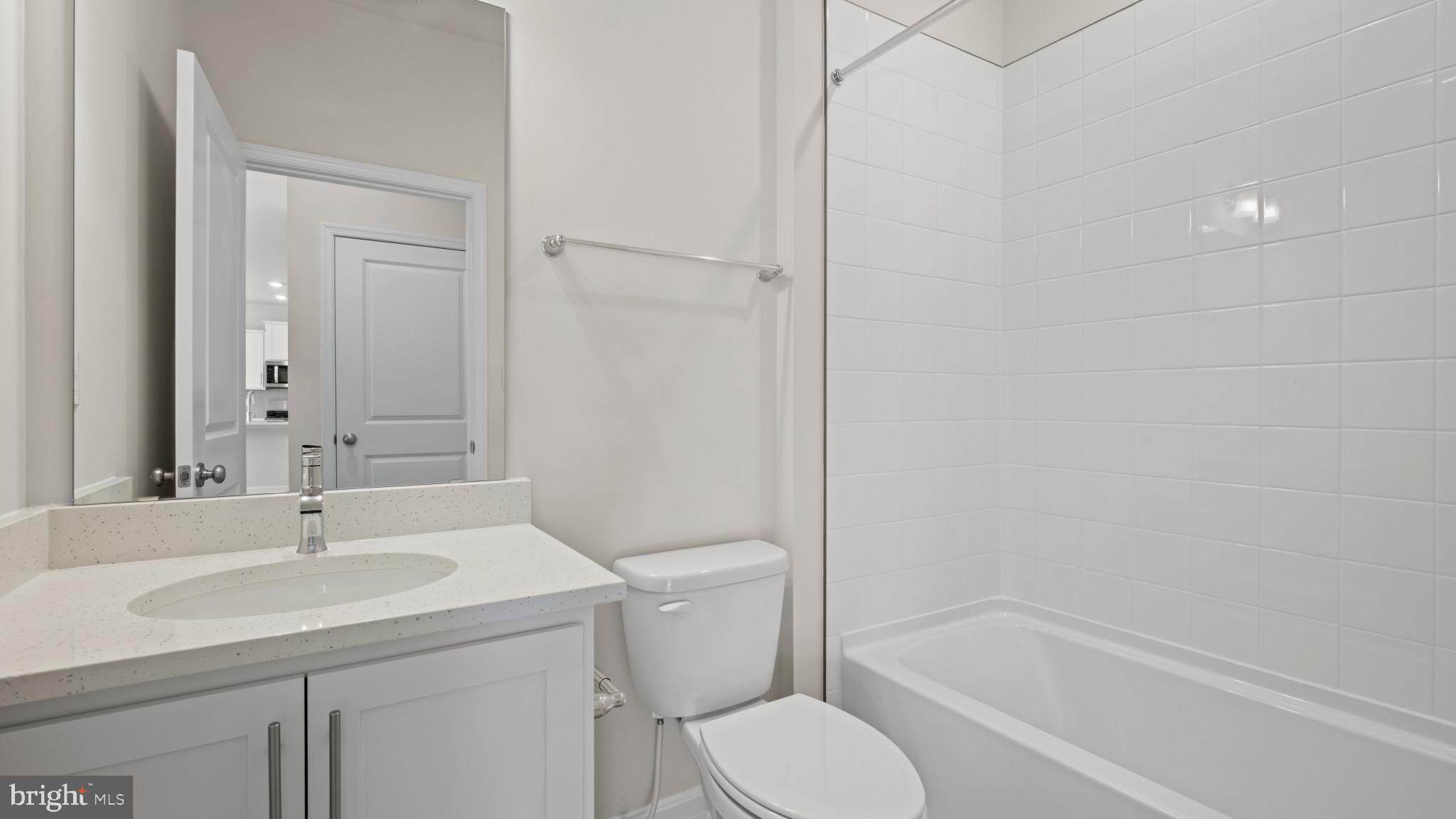 8 Comes Rdg Court Rosedale, MD 21237 - Photo 15 of 54 a bathroom with a sink toilet and shower