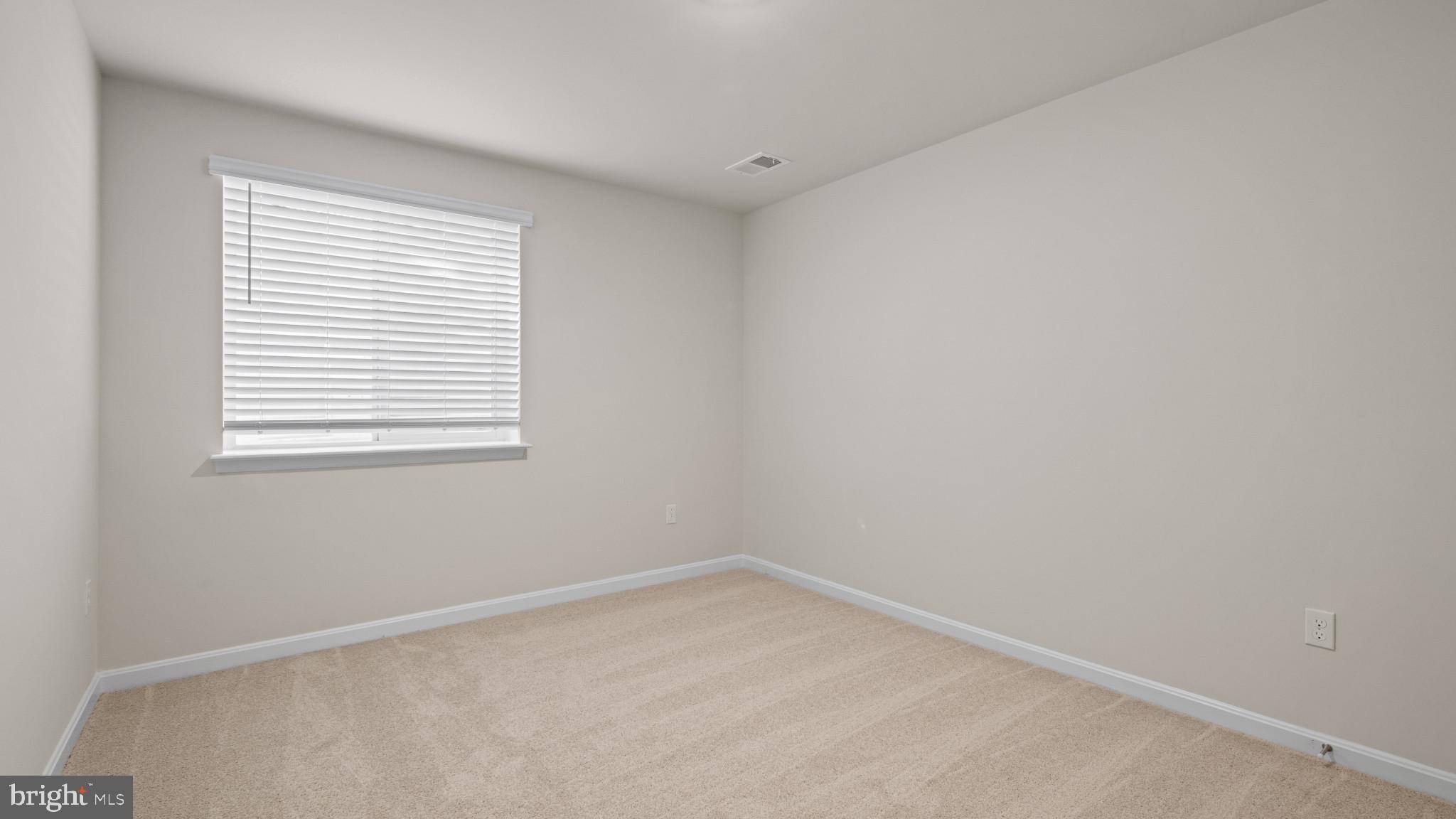 8 Comes Rdg Court Rosedale, MD 21237 - Photo 18 of 54 an empty room with a window