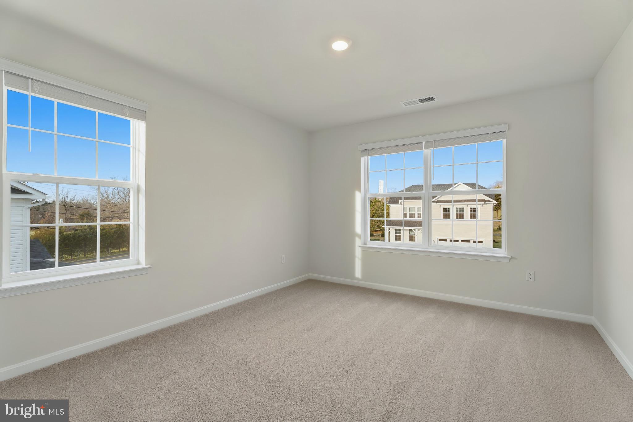 8 Comes Rdg Court Rosedale, MD 21237 - Photo 20 of 35 a view of an empty room with a window