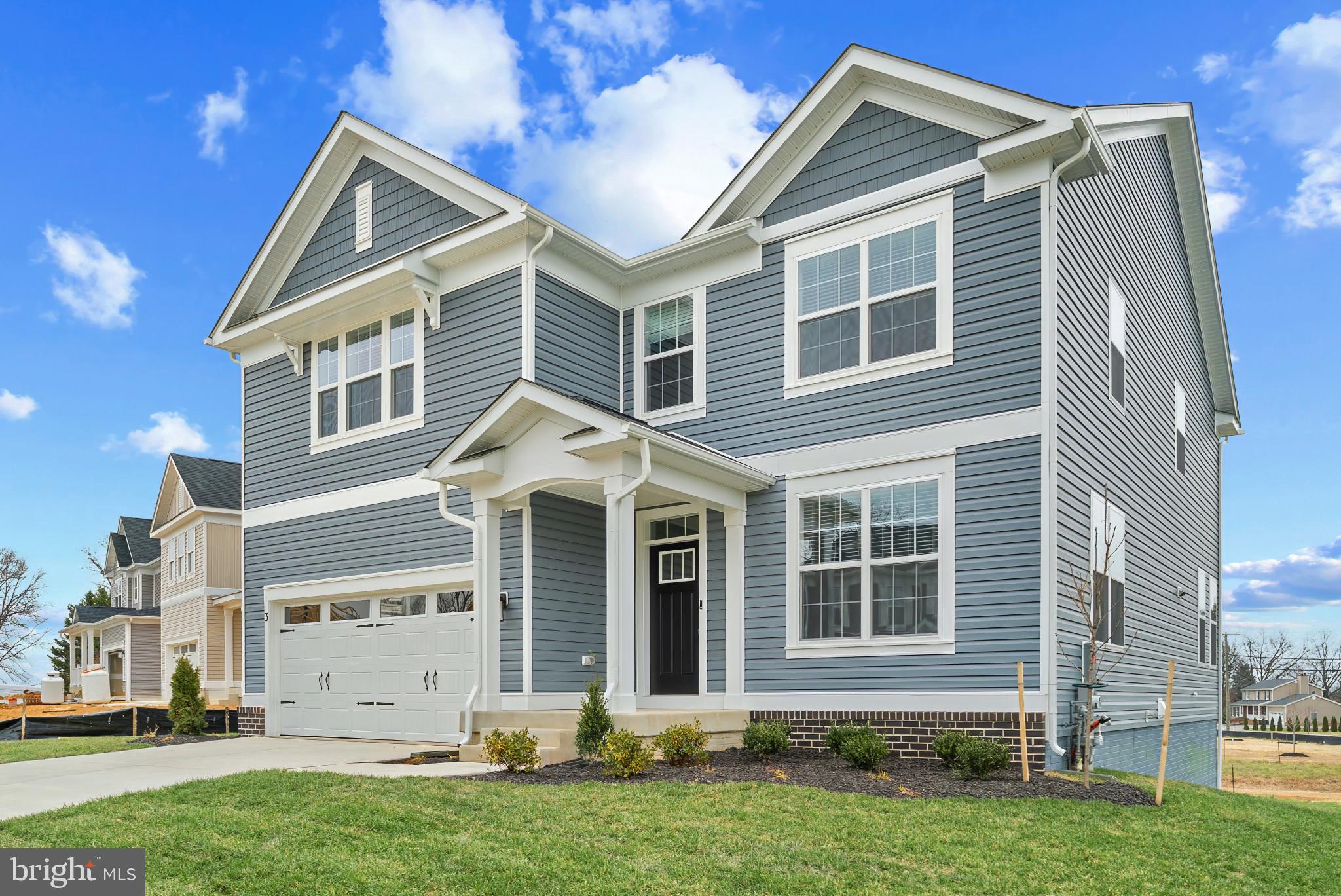 8 Comes Rdg Court Rosedale, MD 21237 - Photo 2 of 35 front view of a house with a yard