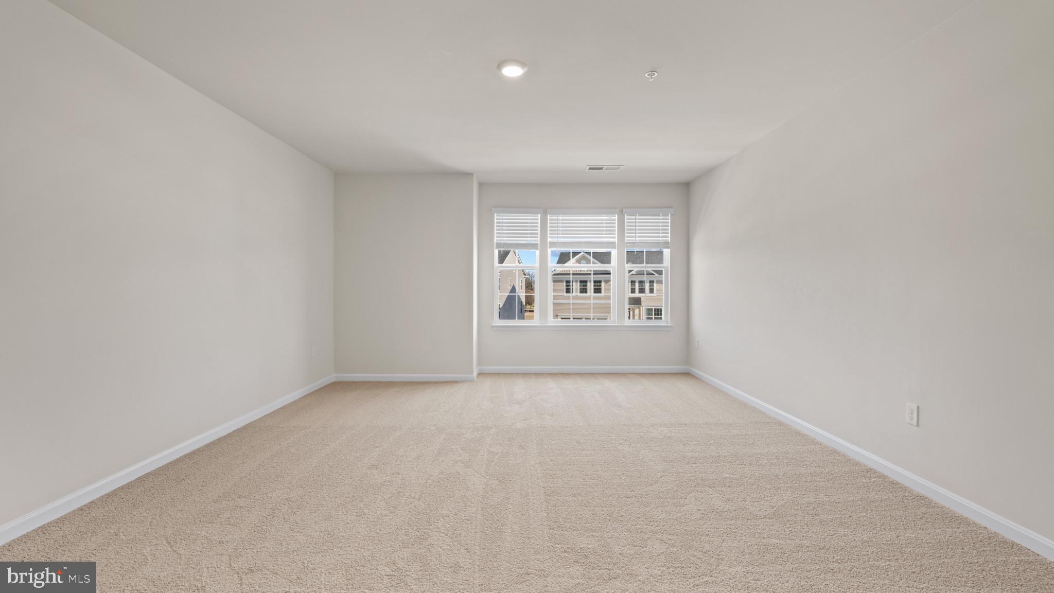 8 Comes Rdg Court Rosedale, MD 21237 - Photo 23 of 54 an empty room with windows