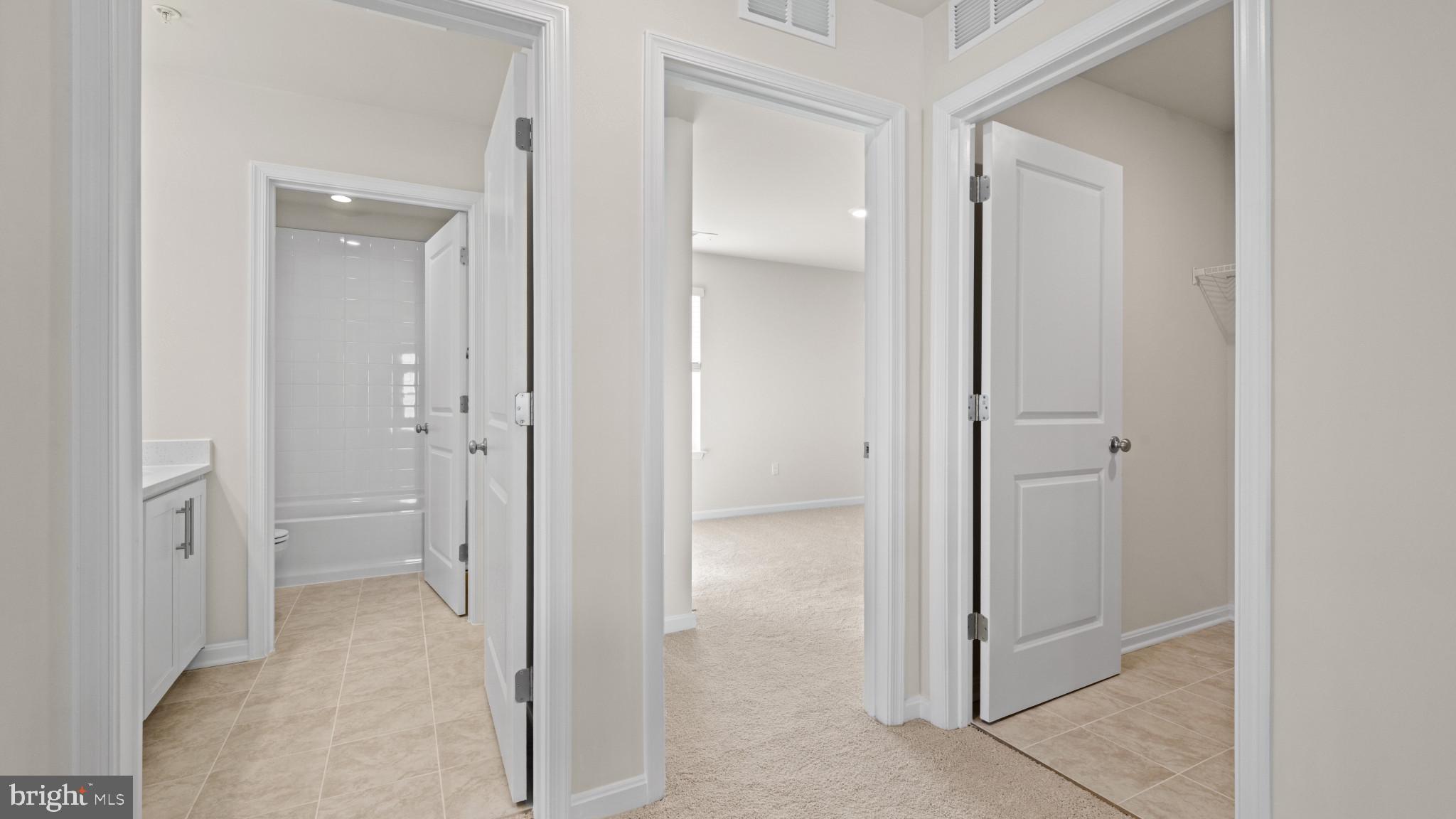 8 Comes Rdg Court Rosedale, MD 21237 - Photo 25 of 54 a view of a bathroom with a glass door shower