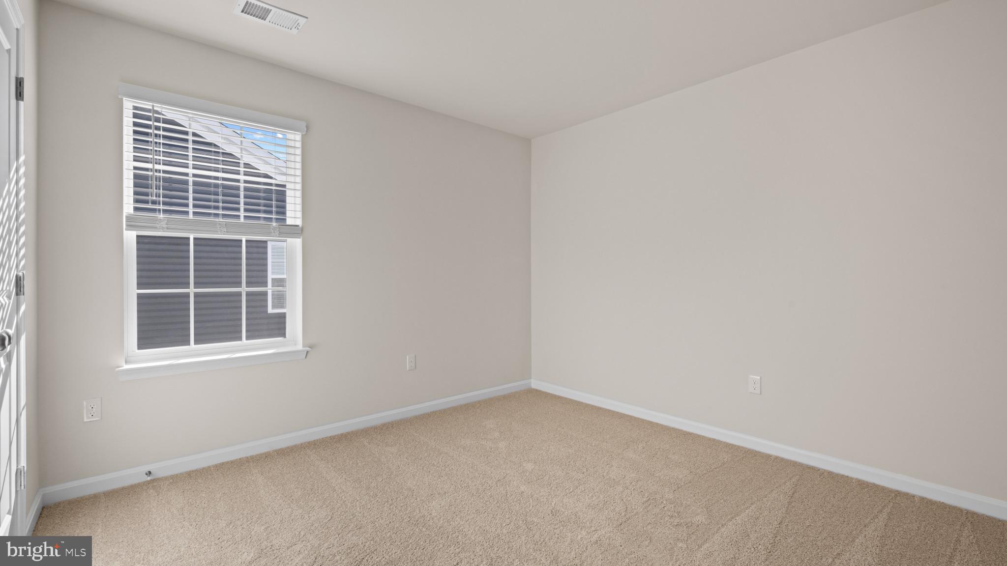 8 Comes Rdg Court Rosedale, MD 21237 - Photo 26 of 54 an empty room with a window