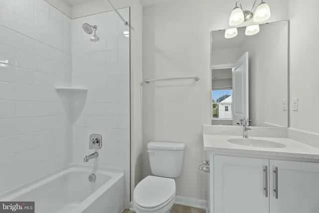 a spacious bathroom with a double vanity sink a mirror and a shower