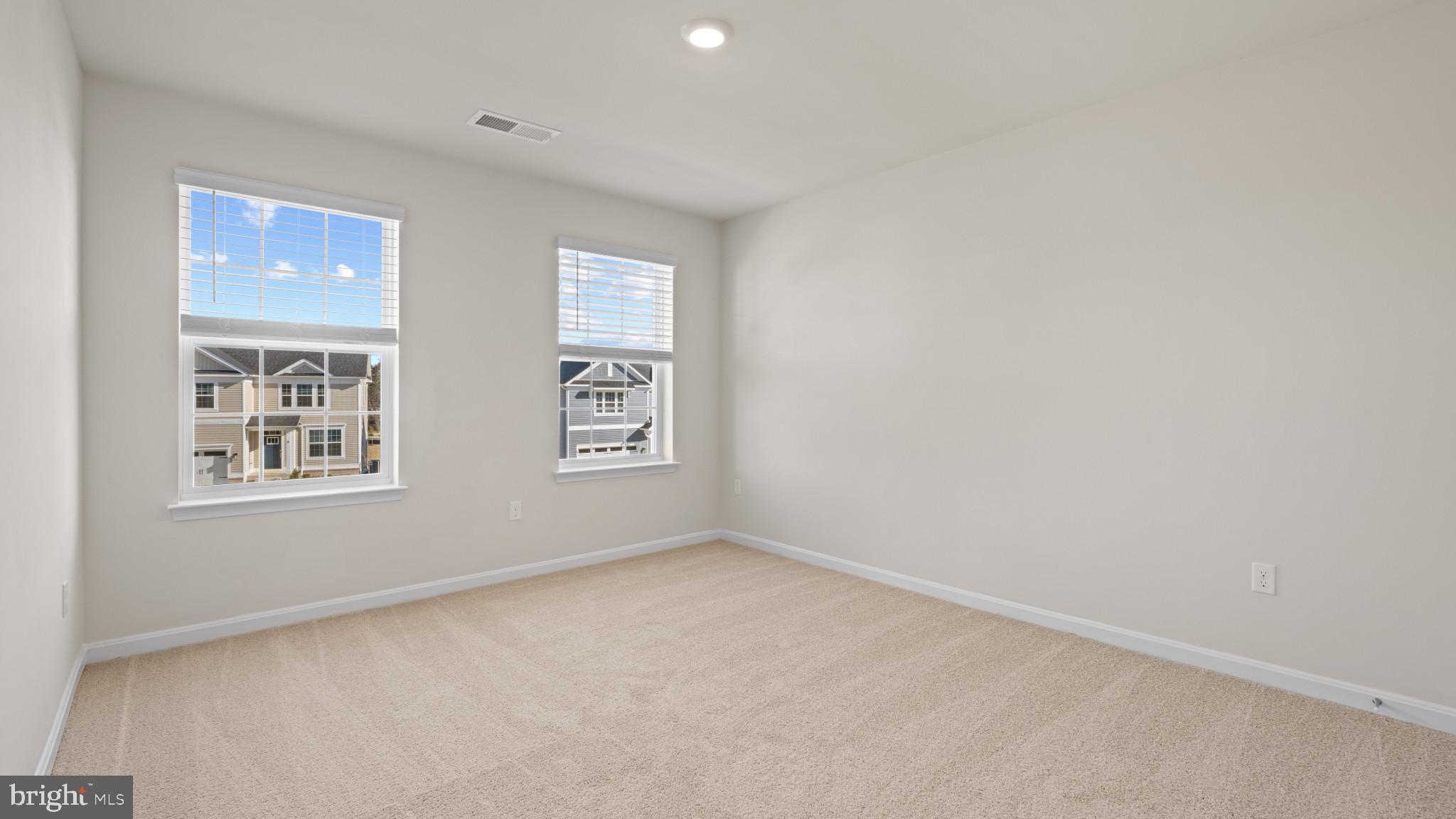 8 Comes Rdg Court Rosedale, MD 21237 - Photo 28 of 54 an empty room with windows