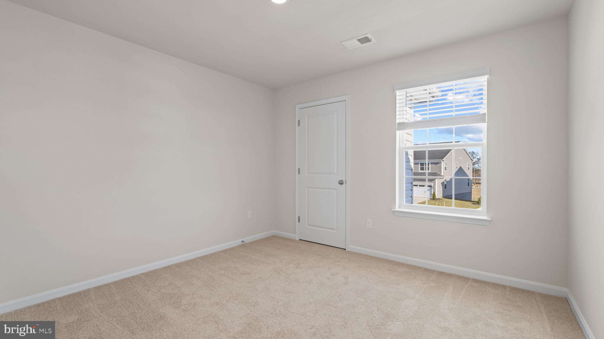 8 Comes Rdg Court Rosedale, MD 21237 - Photo 30 of 54 an empty room with a window