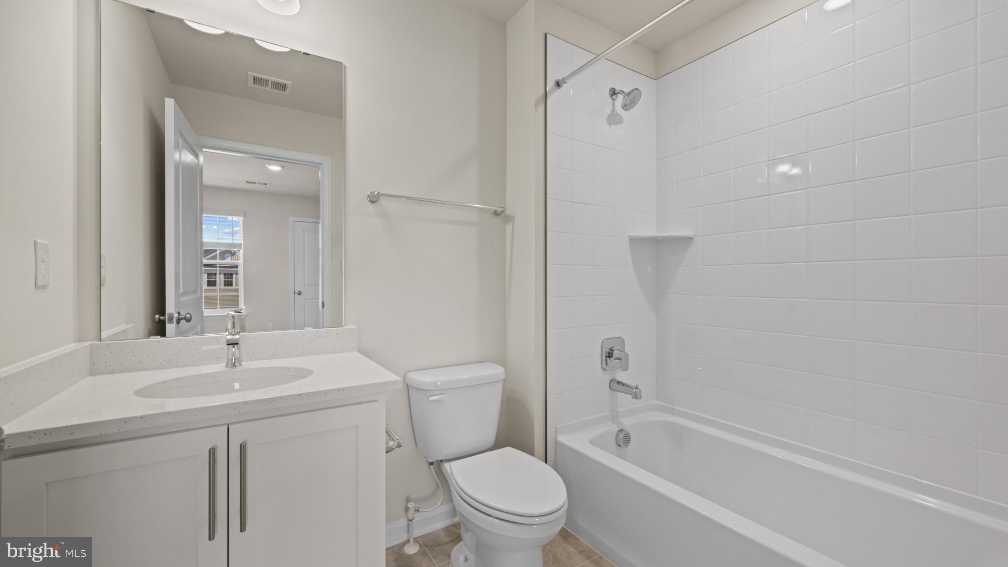 8 Comes Rdg Court Rosedale, MD 21237 - Photo 32 of 54 a bathroom with a sink a toilet and shower